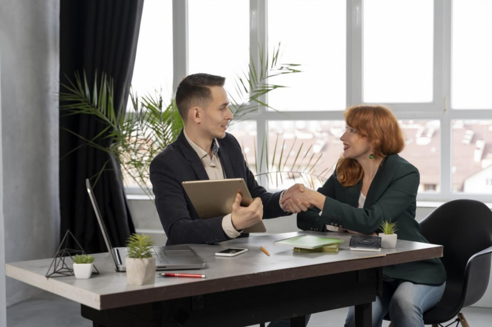 Detailed financial analysis charts and planning documents spread across table